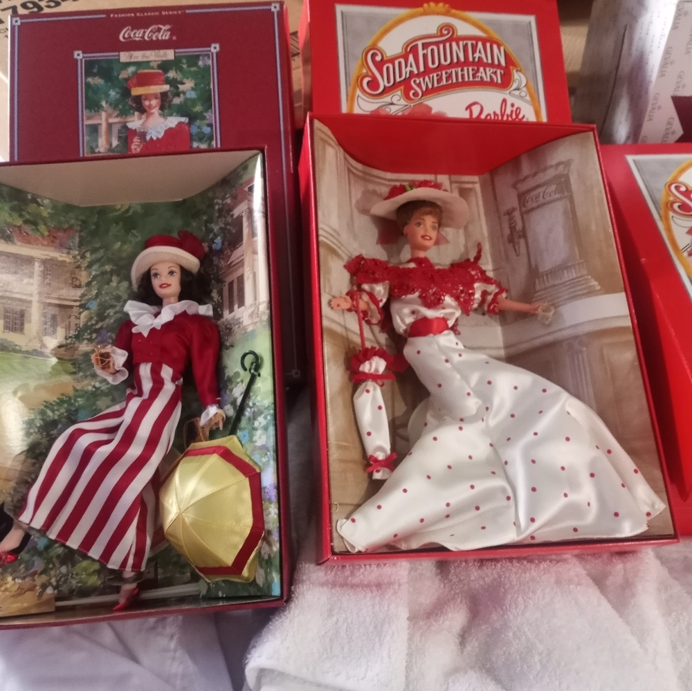 I have 5 Coca-Cola Collector Edition Barbie dolls